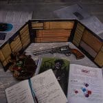 Spire books, notepad, dice with pouch, gun and GM screen on a white wooden table ready to play © SHAW STUDIO