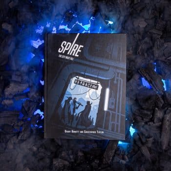 Spire front cover on black coals backlit with blue lights © SHAW STUDIO