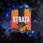 Strata front cover on black coals with smoke and blue lights © SHAW STUDIO