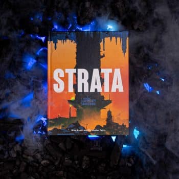 Strata front cover on black coals with smoke and blue lights © SHAW STUDIO