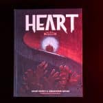 Heart front cover surrounded by blood with red lighting © SHAW STUDIO