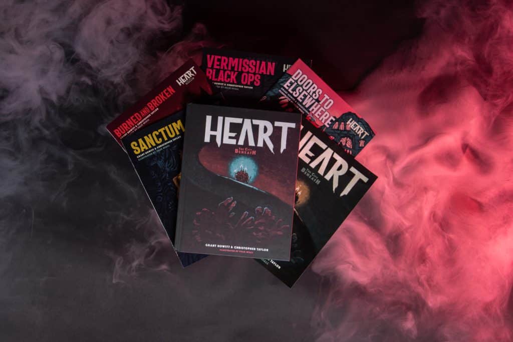 Everything Heart books bundle with smoke and red lighting © SHAW STUDIO
