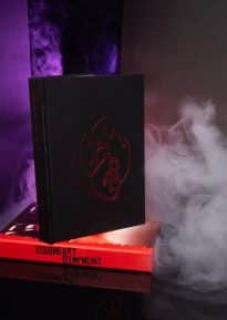 Voidheart Symphony deluxe edition and slipcase with smoke and purple lighting © SHAW STUDIO