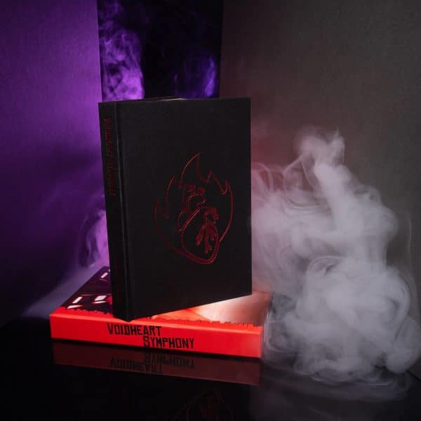 Voidheart Symphony deluxe edition and slipcase with smoke and purple lighting © SHAW STUDIO