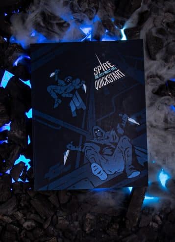 Spire quickstart guide front cover on black coals with smoke and blue lights © SHAW STUDIO