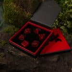 Inside view of DIE RPG resin dice surrounded by green foliage and smoke ©SHAW STUDIO