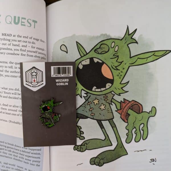 Wizard goblin pin on pages of Goblin Quest