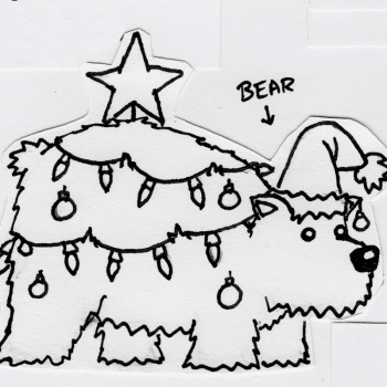 A large bear bedecked in Christmas lights, with a star balanced on its back. The bear is wearing a Santa hat.