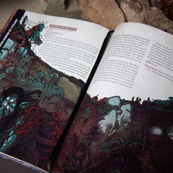 Dagger in the Heart glamour shot showing double-page art by Sar Cousins